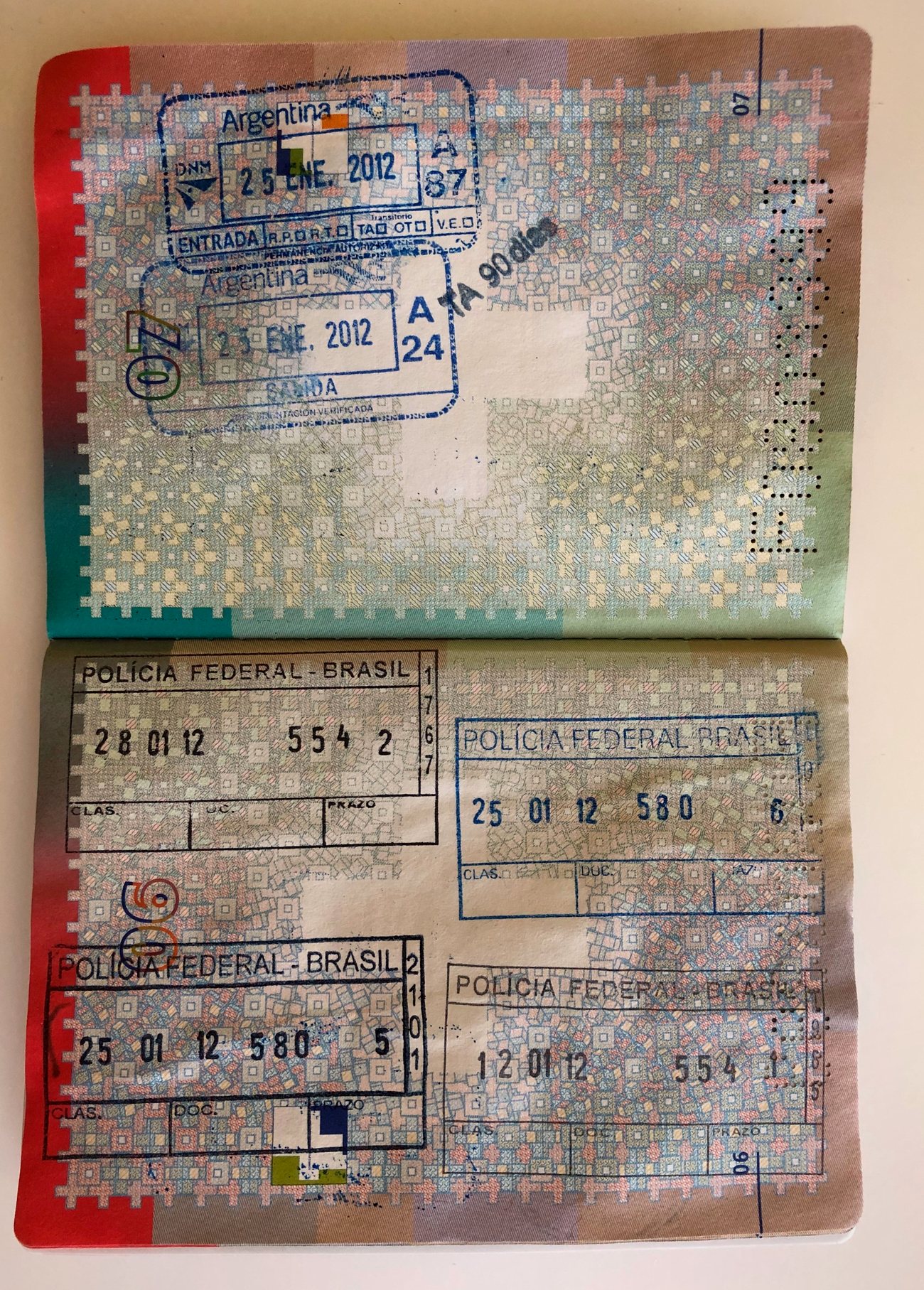 A passport and identity documents laid out for a property purchase