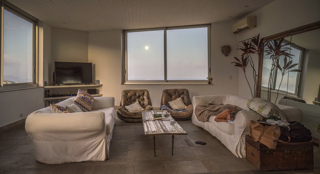 Interior of a bright Rio apartment with a view toward the hills
