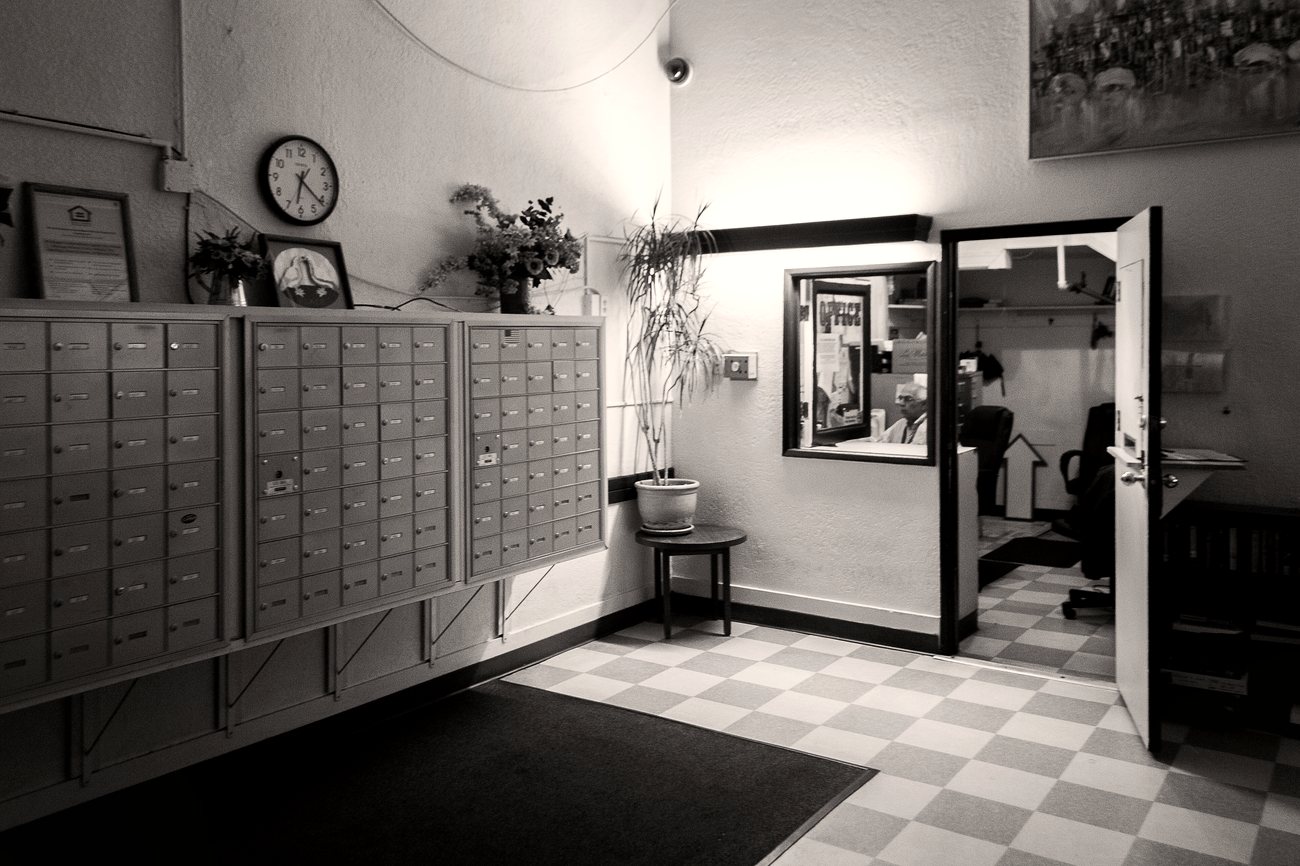 Reception desk and lobby of a residential apartment building