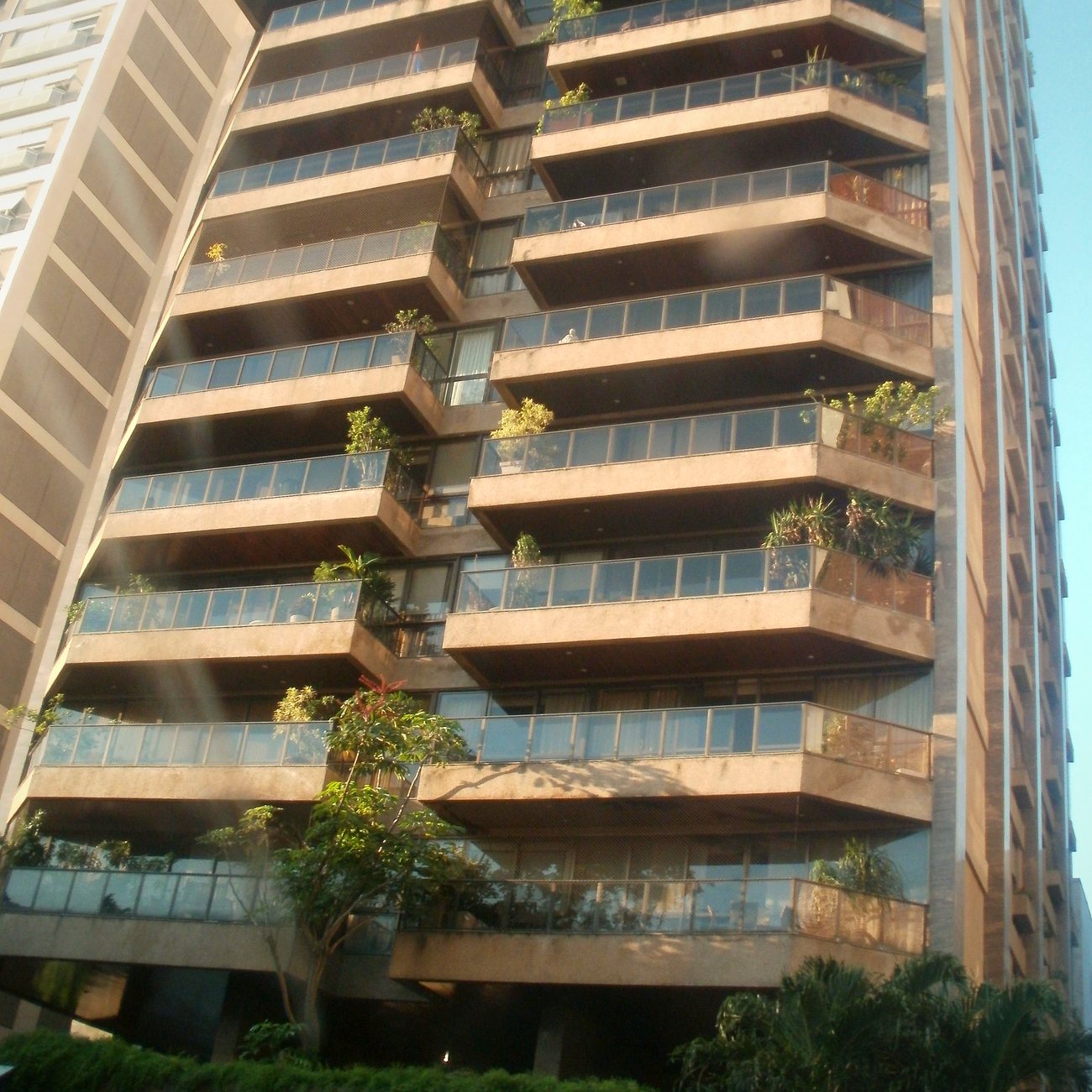 Tree-lined residential street with apartment buildings in Ipanema, Rio de Janeiro