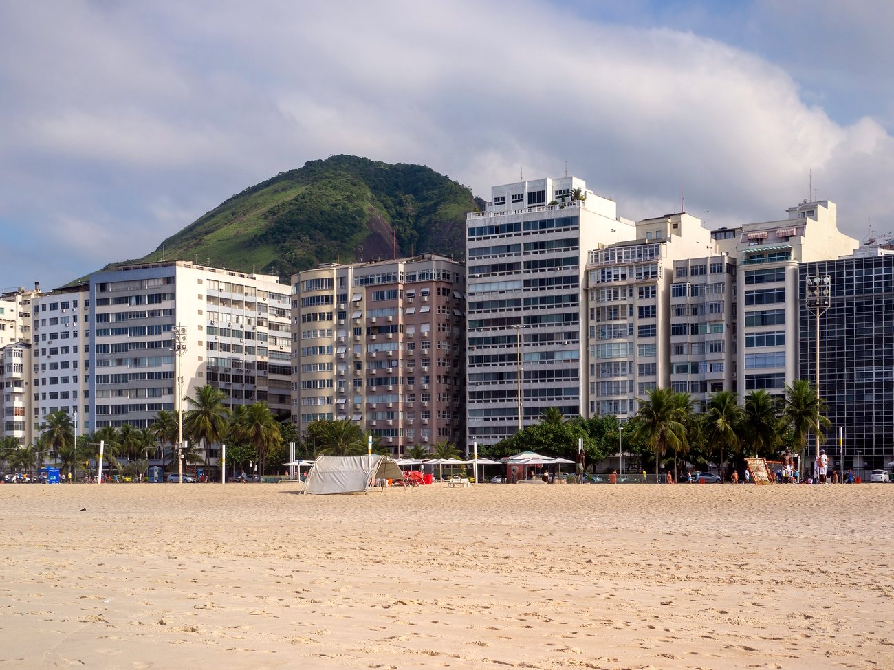 Aerial view of Copacabana beach and its dense row of apartment buildings