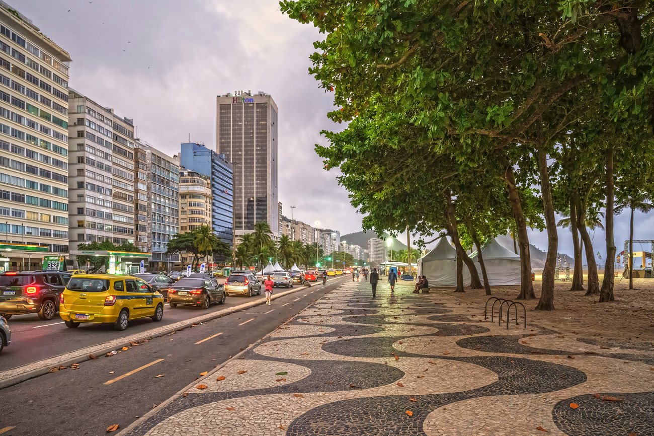 Copacabana beachfront with residential apartment towers behind the sand