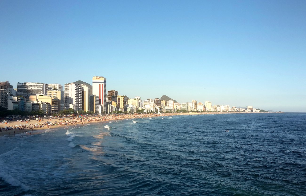 The Leblon waterfront with its row of residential towers behind the sand