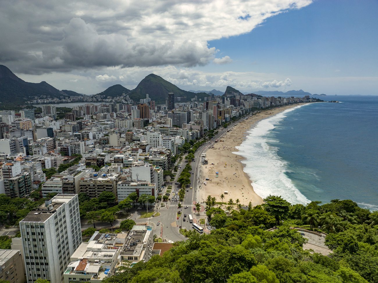 Apartment buildings behind the sand at Leblon beach in Rio de Janeiro